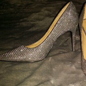 Michael Kors Dorothy Flex pumps with a glitter chain mesh finish.